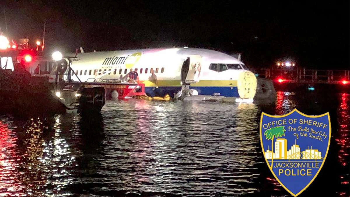 Boeing 737 crashes off end of runway and into a river leaving 21 injured - The National