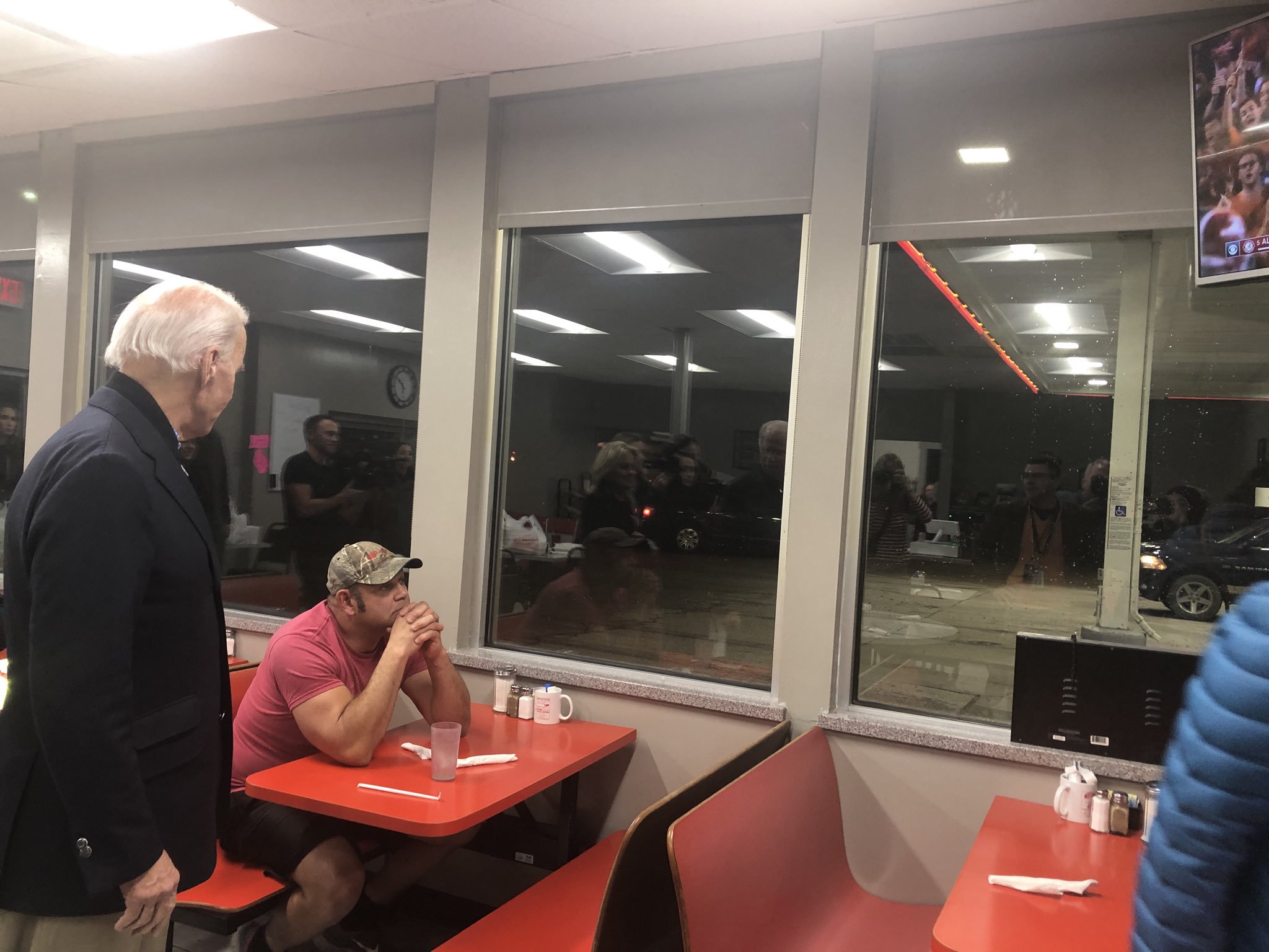 Man Ignores Joe Biden While Watching a Football Game at Diner in Iowa