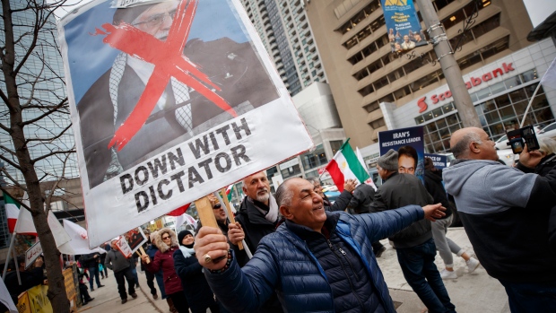 Dozens of Iranian-Canadians rally in North York after death of top general in Iran | CP24.com