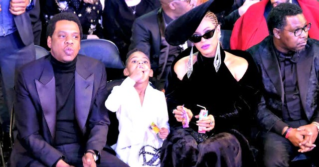 WATCH: Jay-Z, Beyonce, Sit During the National Anthem