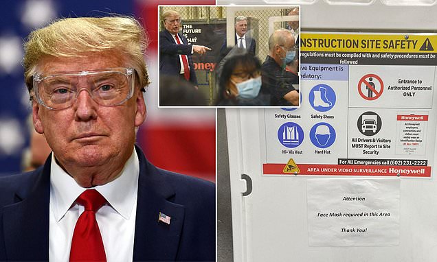 Donald Trump ignores compulsory masks sign as he tours MASK factory | Daily Mail Online