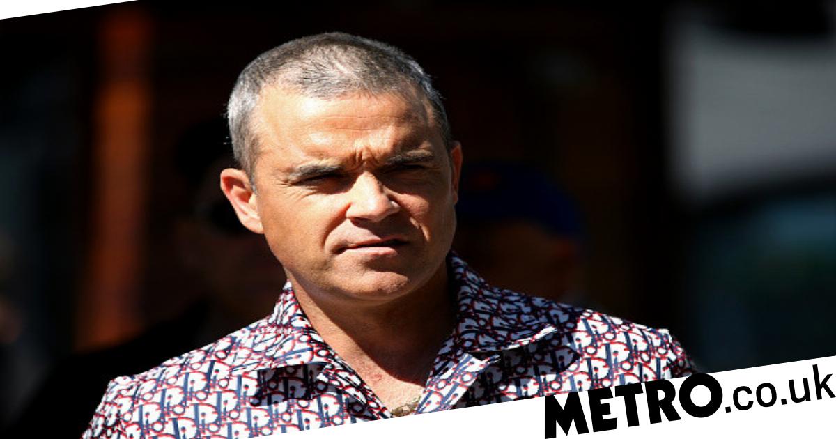 Robbie Williams Pizzagate: Star claims conspiracy theory not debunked | Metro News