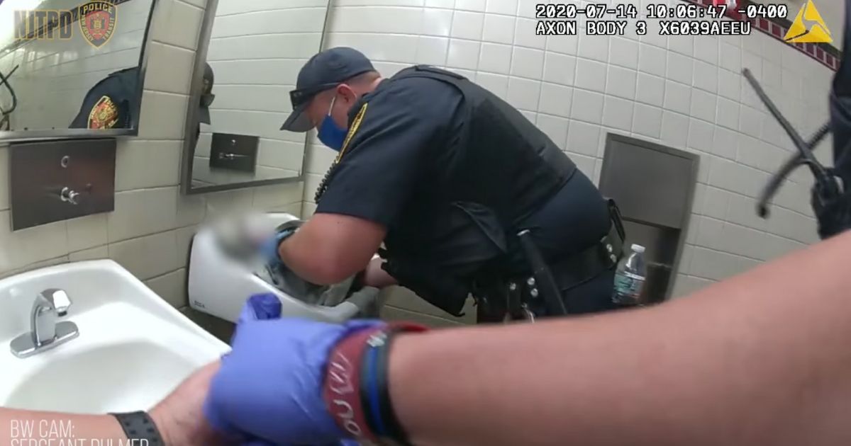 Watch: Police Officer Works Quickly To Save Life of Newborn Born in Train Station Bathroom