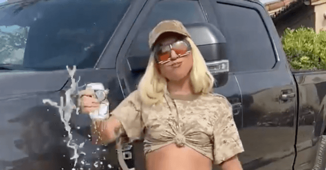 WATCH: Lady Gaga Appeals to Voters: Wears Camo, Crushes Beer Can by a Truck