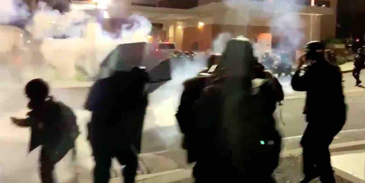 Antifa mob thinks it has cops retreating — until the tough leftists get pelted with flash bangs and tear gas - TheBlaze