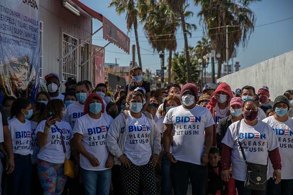 Photos: Migrant group wearing Biden shirts try to cross US/Mexican border | American Military News