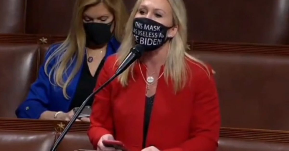 Rep. Marjorie Taylor Greene Mask Reads “This Mask Is As Useless As Joe Biden”