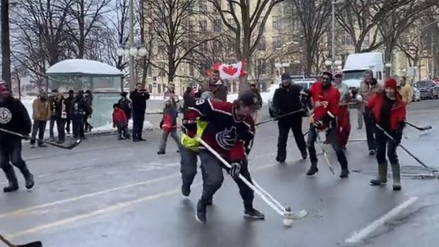 "Hateful" truckers "violently" clearing sidewalks and playing hockey