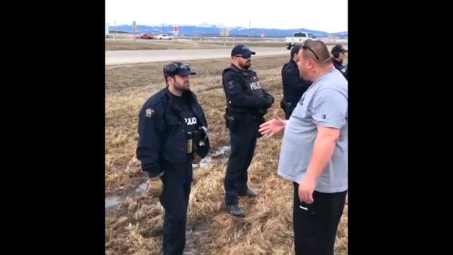 Alberta CANADA ??- Man asks to shake the hands of Police officers and this is what happened!...